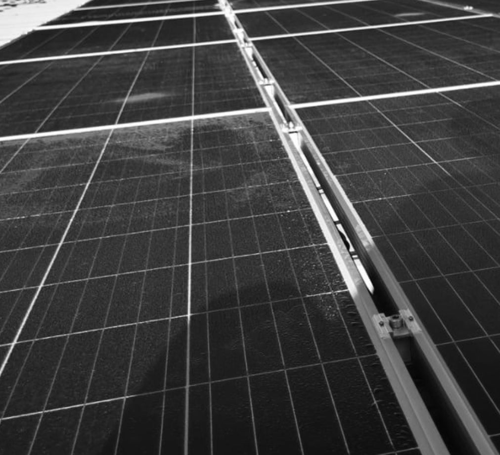 Close Up Of Solar Panels On A Roof | Dip &amp; Doze